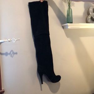 Thigh high black boot